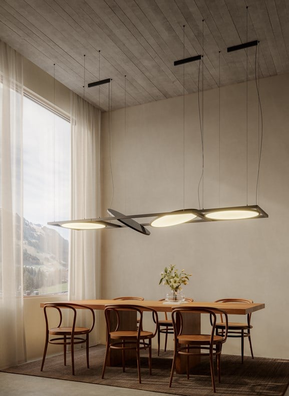 Suspended lighting above dining table