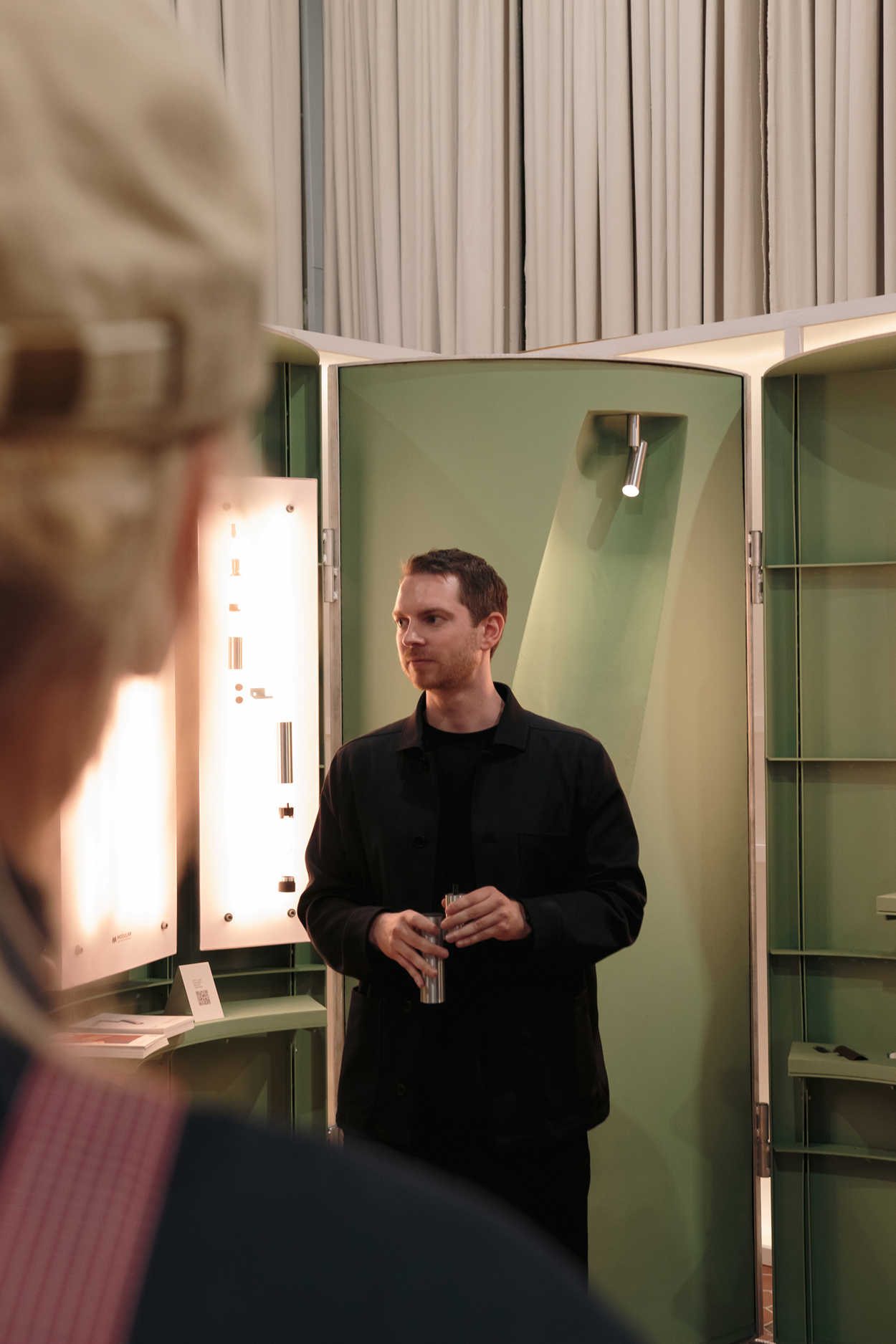 Seppe van Heusden explains Passage to architects at the booth