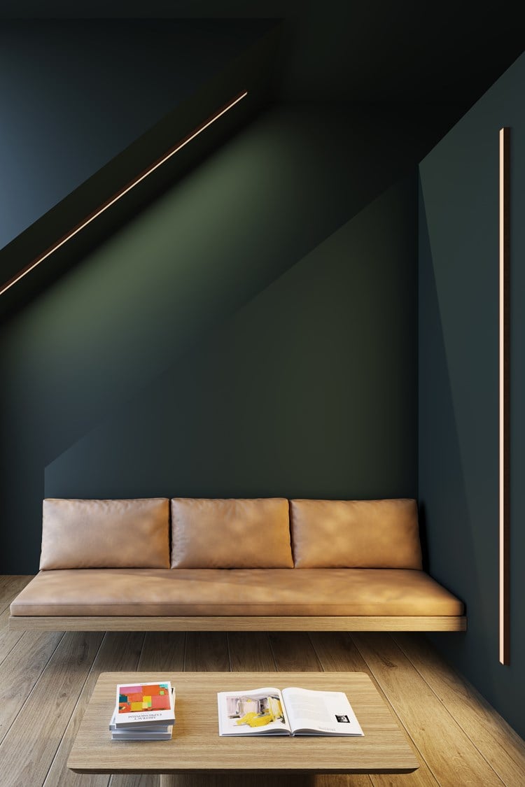 Iluminación lineal minimalista en el interior de un loft moderno