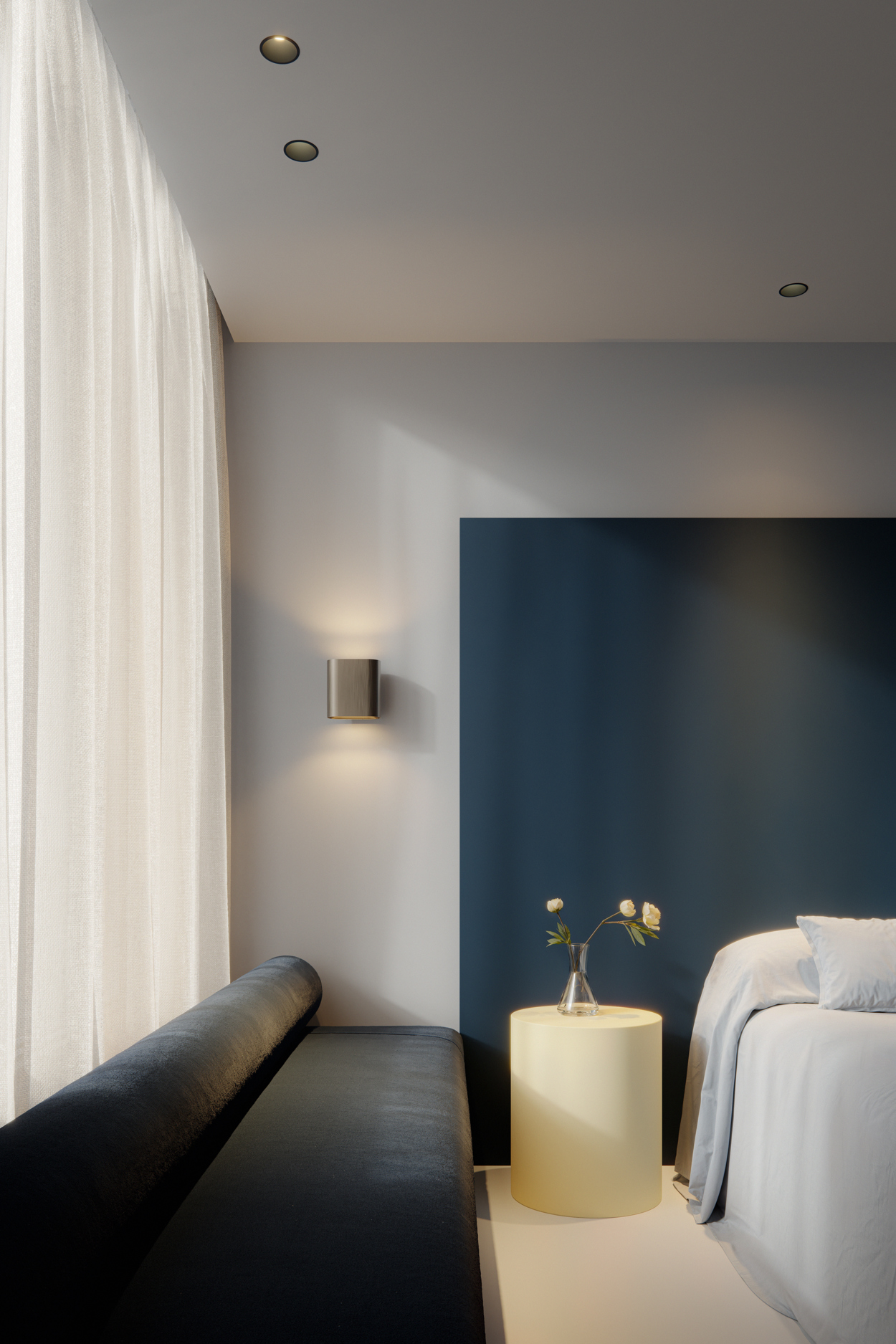Recessed downlighters and wall lighting in blue bedroom