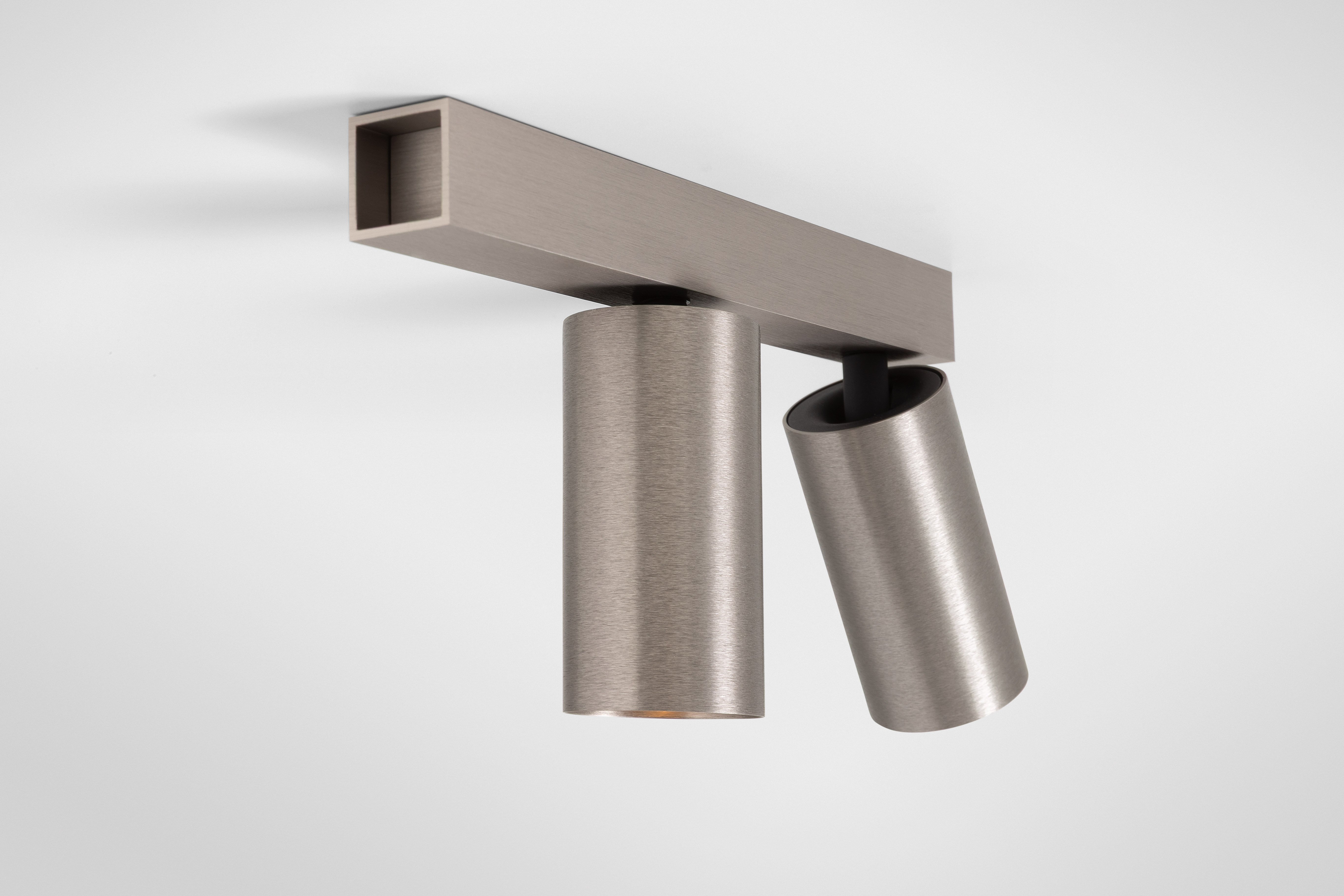 Minude surface mounted luminaire silver bronze brushed anodised