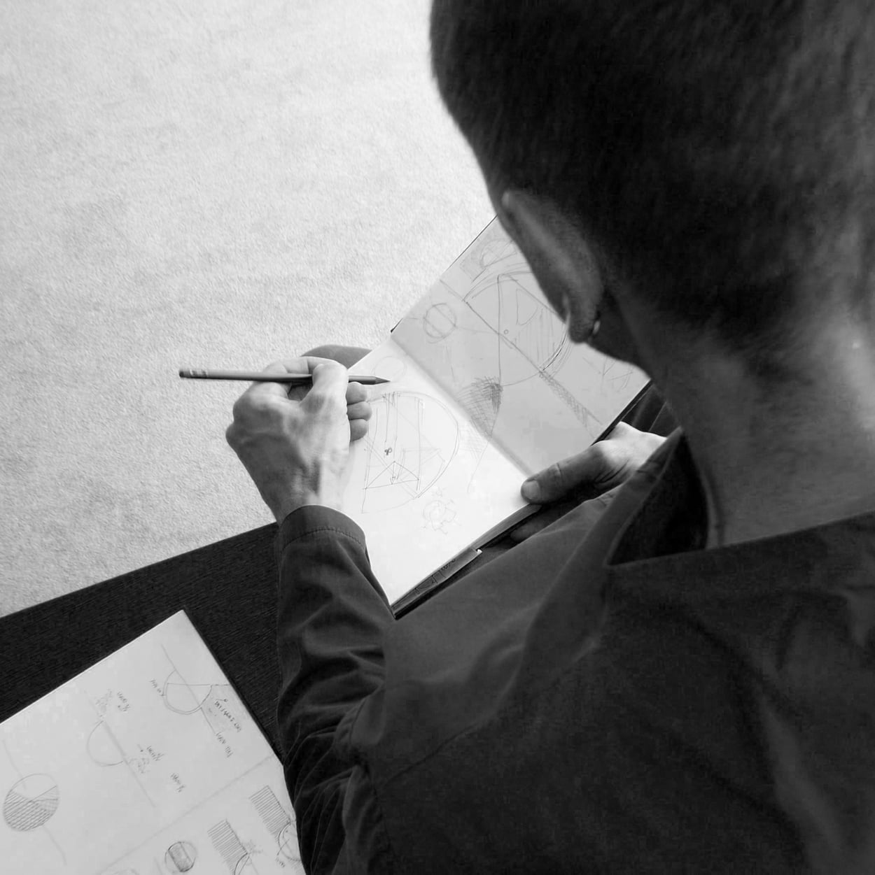 James Van Vossel with sketch book drawing Hollow