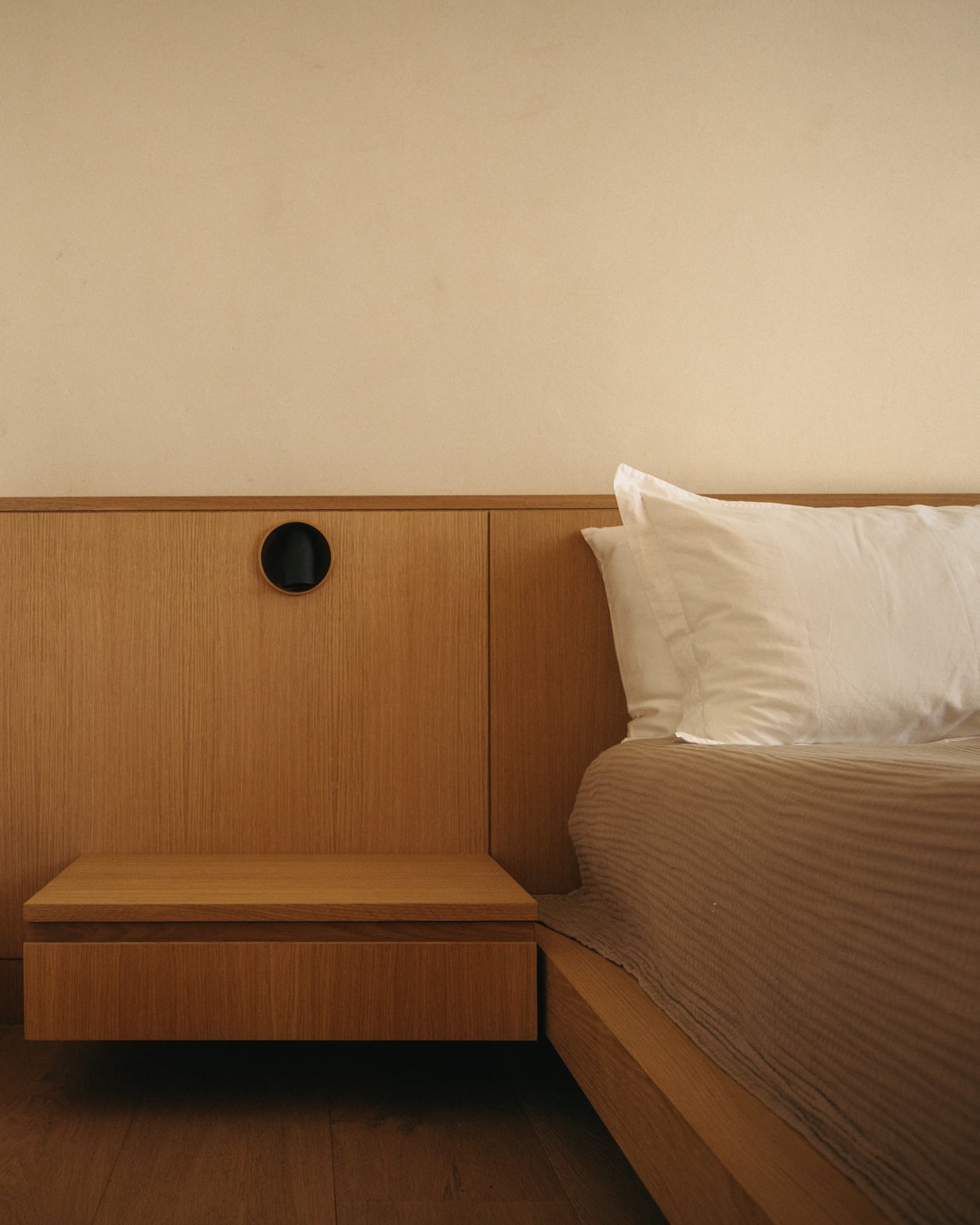 Hollow in bedroom of a private residence next to the bed