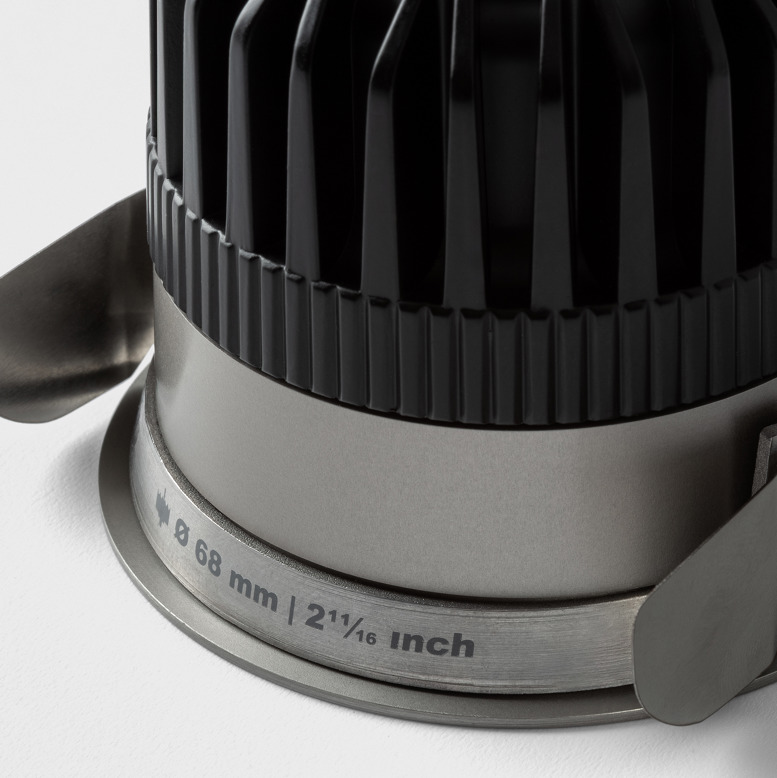 Detailed image of the spring-mounted ring of the Klevr which allows it to be installed without tools.