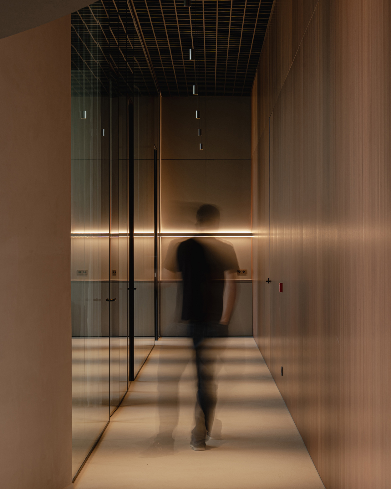 Minude Suspended in office hallway