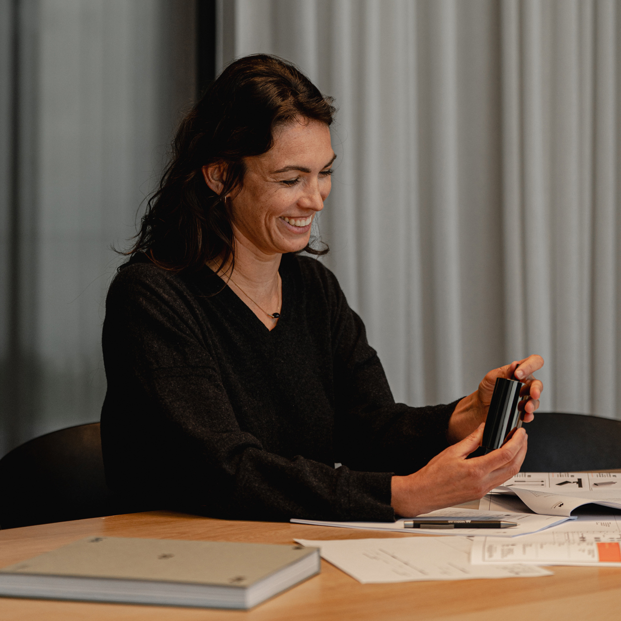 Lighting designer of Modular Lighting Instruments explaining an office project