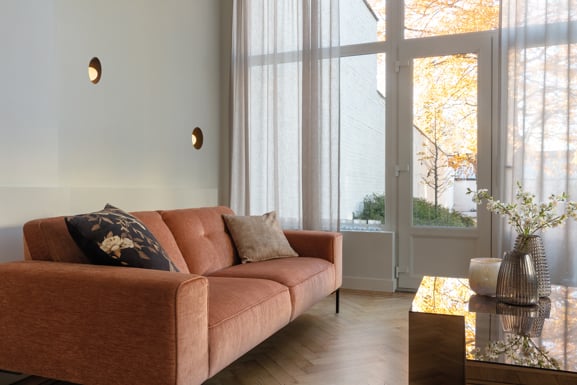 Round wall lighting in living room