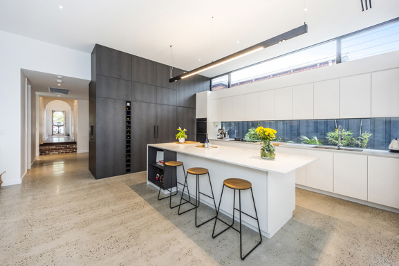 Profile lights above a modern kitchen island