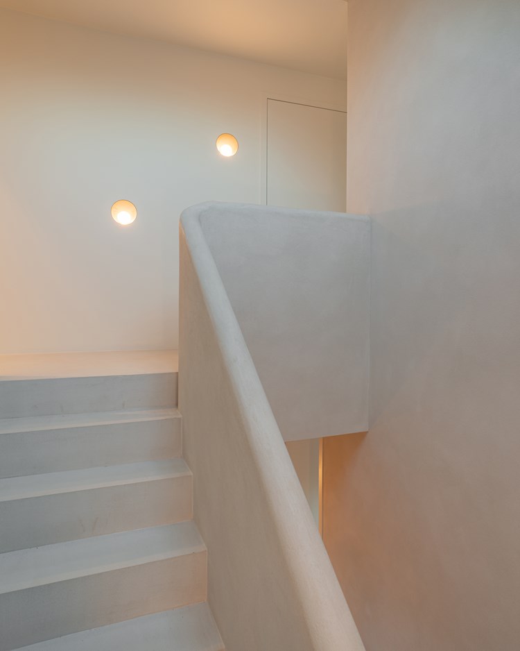 Stairway with wall lighting