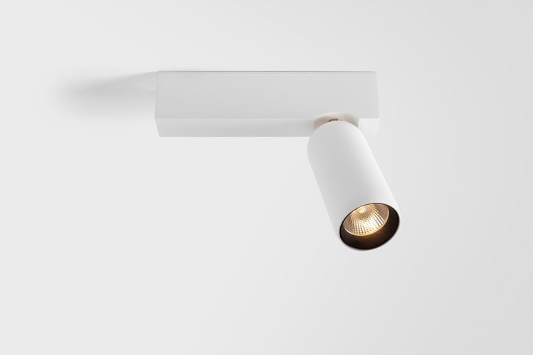 Modern white ceiling luminaire with endless rotation